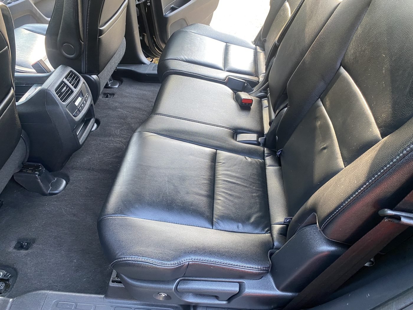 Cleaned black leather rear seats