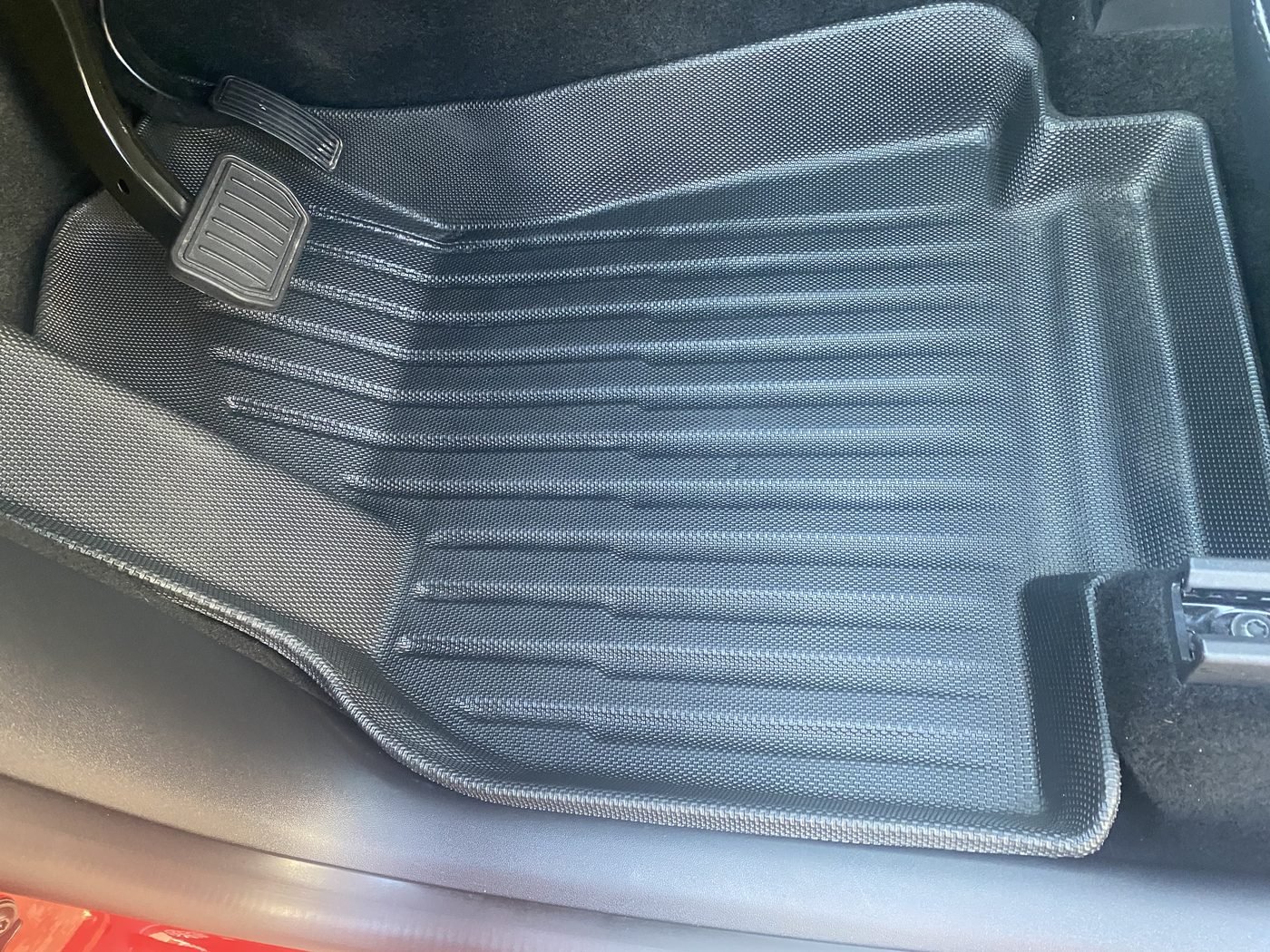Floor mat fully cleaned after interior detailing